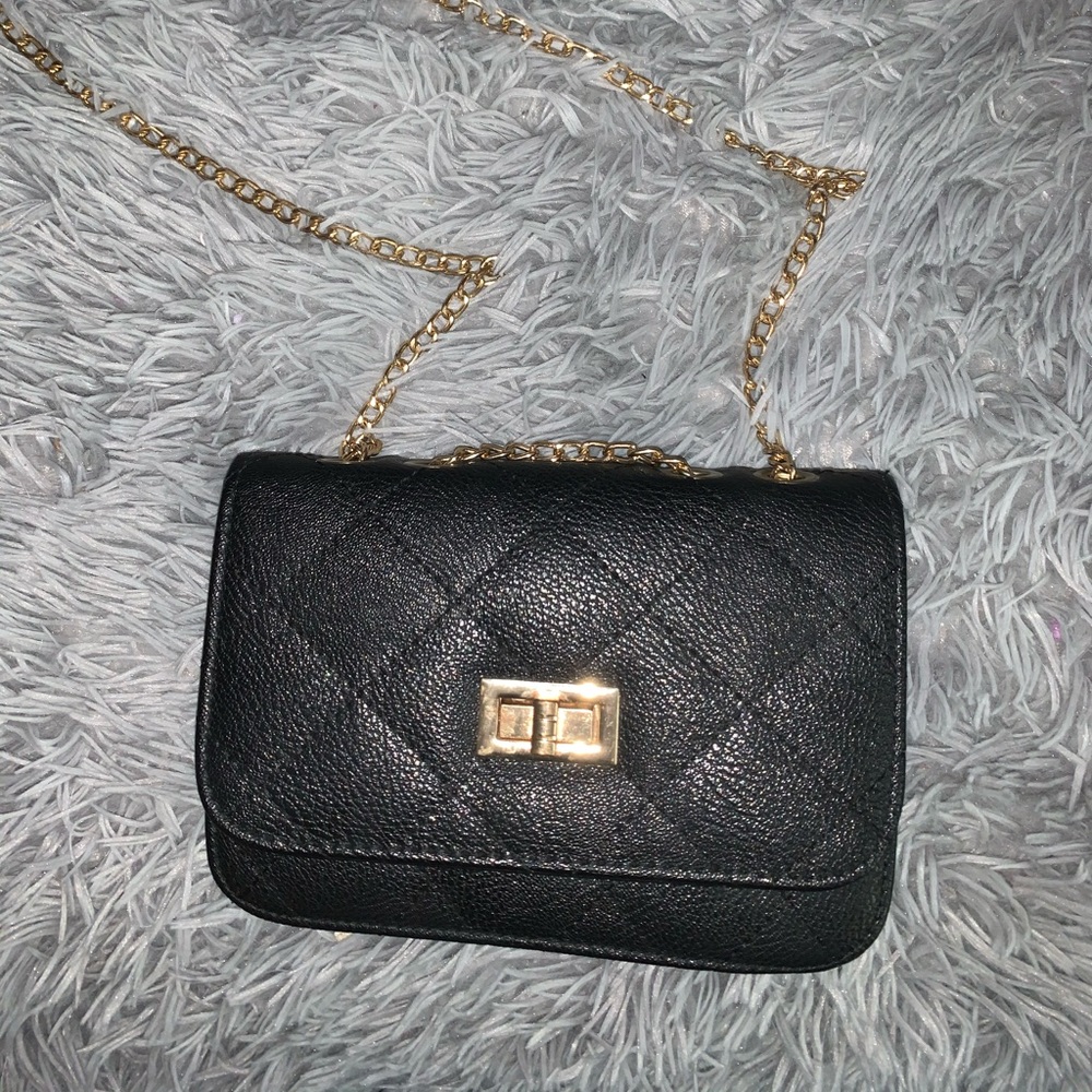 Black bag with gold chain